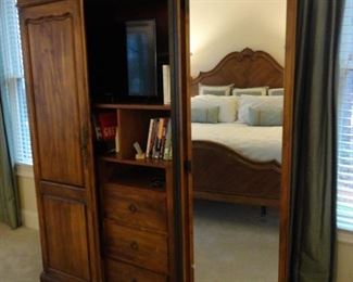 Cabinet has glass and drawers on both sides (TV not for sale)