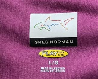 Many Large Greg Norman golf shirts.