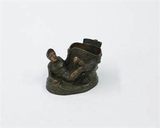 Figural cast iron match holder