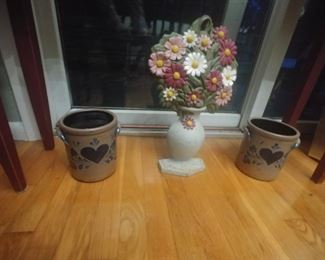 Cast iron doorstop $30
Decorated Crocks $20 each