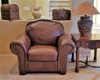 Matching leather club chair.