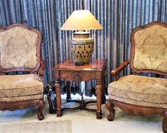 2 beautiful fabric and wood chairs.
