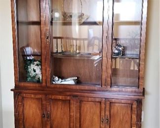 Not too big china cabinet. Lots of glass to showcase more items than the usual china cabinet.