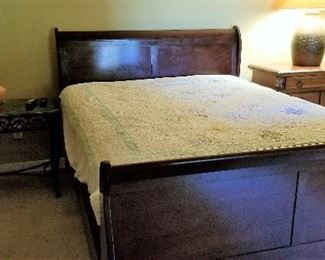 Another sleigh bed and more side tables