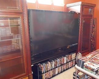 BIG Screen TV (2 cabinets on either side has highly carved top and is a display cabinet)