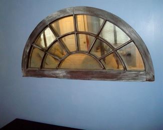 Vintage window with mirror panels.
