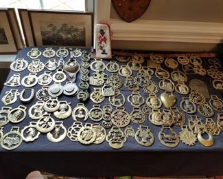 large selection of decorative brass horse harness medallions