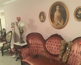 Victorian style Cameo sofa in mahogany and rose velvet. Made by Heirloom Reproductions in Montgomery AL. Still has original tag!