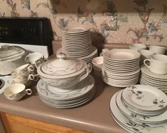 Four sets of dishes for every day use. See other pics for marks on bottom. 