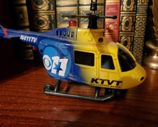 KTVT Helicopter.  Not a real one, a replica.  Why are they always hovering above my house and shouting at me?   I only have robbed three convenience stores, a nail salon, and a toilet store.  