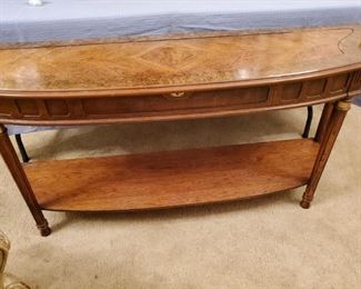 Hall Table.  As in you put it in a hall. That is not the brand name.