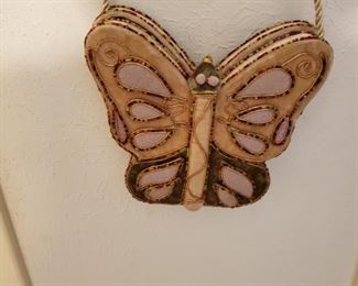 Butterfly purse.  Cause your money is gonna fly right out of it...