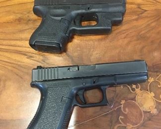 Small:  Glock 26
Large: Glock 22