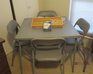 Card Table w/ 4 chairs.  Excellent condition.  Games