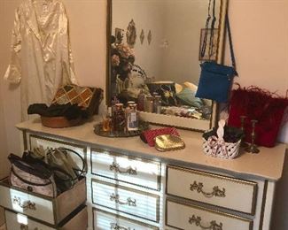 60's mirror dresser reflecting the dystopian multiverse co-dimension, which is fine