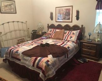 bed with butterfly coat on top