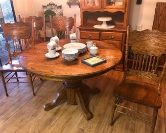 Oak table and chairs fit for Little Women to sit around and peel potatoes
