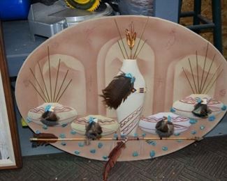 Leather Oval With Feather and Arrow by Sabide Johnson