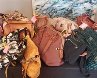 Coach, Dooney, and Brahmin purses, some new with tags.