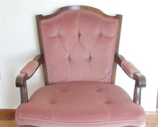 Antique chair with some tearing on seat corner