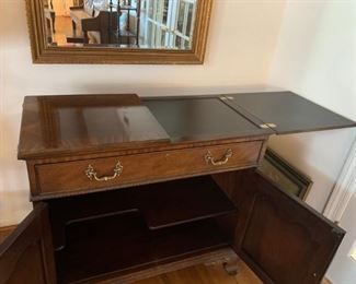 #15 Rittenhouse square by Henredon buffet with 1 drawer and 2 doors and flip top on wheels 38-76x18x36 $350.00