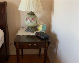 #34 pink flower rose ceramic lamp 27 tall $75.00
#4 Drexel drop side end table oval with 1 drawer and inlay 18-35x28x27 as is finish 2@100 each