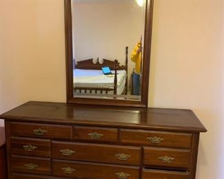 #37 cherry dresser with mirror 11 drawers 61x20x33 mirr 30x52 $125.00
