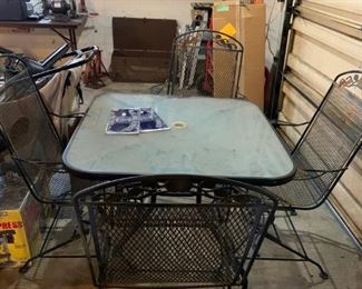 #208 glass top square patio with 4 springy chairs 36"×27" $100.00
