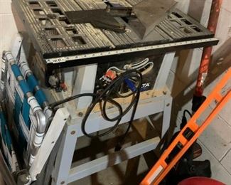 #216 delta table saw 10" on stand $100.00