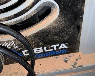 #216 delta table saw 10" on stand $100.00