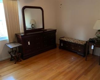 #30 cabinet dark cherry look wood dress with 8 drawers and mirror 68x20x36 mir39x39 $175
#33 cabinet lane cushion top cedar chest 48x18x21 $125.00