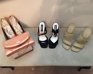 Ladies clothing, shoes & purses. Many never worn.