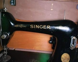 Singer Sewing Machine in Sewing Machine Desk