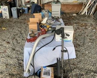 Marine Items including a Scotty downrigger, waste discharge pump, shore power connection 