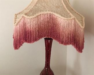 Lamp with cranberry base.  The shade is made from a 100 year old wedding dress