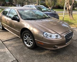 56,513 miles on this 1999 Chrysler LHS. Clean and Cold!