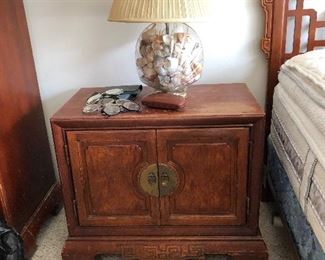 Asian influence nightstand and shell filled lamp