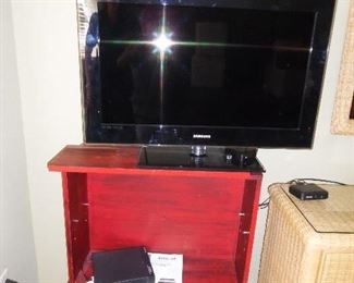 Storage shelf unit. 32" Samsung TV