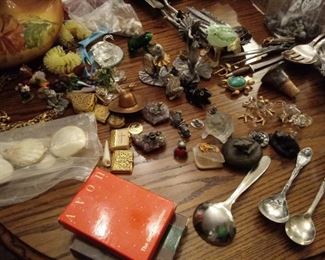 hundreds of small frogs and other tiny collectibles