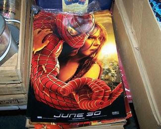 spiderman posters.  thick stack