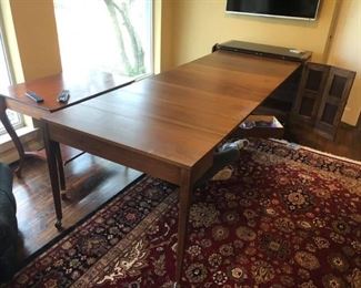 Rare Vintage Expandable Buffet Dining Table
Very unique piece! 
Completely closed up, it measures: 19” deep x 40 1/2” across x 33 1/2” tall to buffet x 31” tall to table.
When expanded fully, it measures: 117” long. 
There are 6 leaves & each measures 15” wide. 
It can be used at all different lengths to accommodate for various amounts of guests. 
Must be able to move and load yourself.