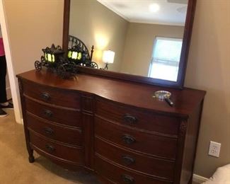Antique Bow front Dixie Dresser with Mirror
Duncan Phyfe Style.
Measures 56” across x 19 3/4” deep x 34” tall.
Mirror measures 43” across x 33” tall.
Must be able to move & load yourself.