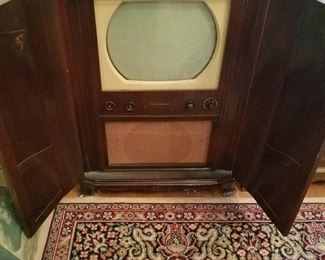 Vintage RCA TV in cabinet