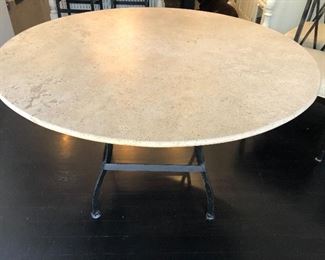Round Stone Top Dining Table 
Crate & Barrel
