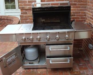 Garage:  This quality stainless GLEN CANYON gas grill is now in the garage.  Keep in mind that grilling time is fast approaching!