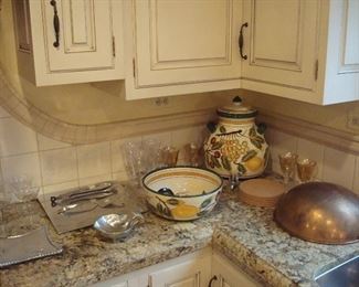Kitchen:  More stemware, aluminum-ware, ceramic-ware, cork pads, and a copper meringue bowl are shown.