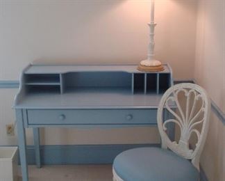 Bedroom #3-Upstairs: A SMART WOOD FORESTRY blue writing desk with dividers on each side and one drawer coordinates well with the creamy white shield back chair. The tall candlestick "Bradburn Gallery" white is ceramic.