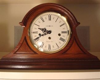 Family Room-Bookcase:  The HOWARD MILLER Westminster mantel clock is Model #613-102 (the key will be with the cashier).