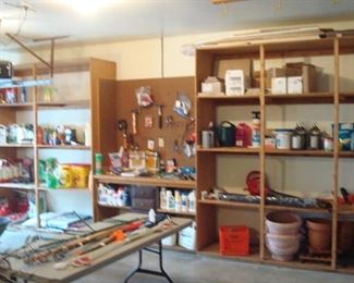 Garage: Yard chemicals, plant stakes, planters and more useful items for this spring are all displayed.
