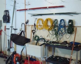 Garage:  More yard tools, hand tools, and extension cords are for sale.